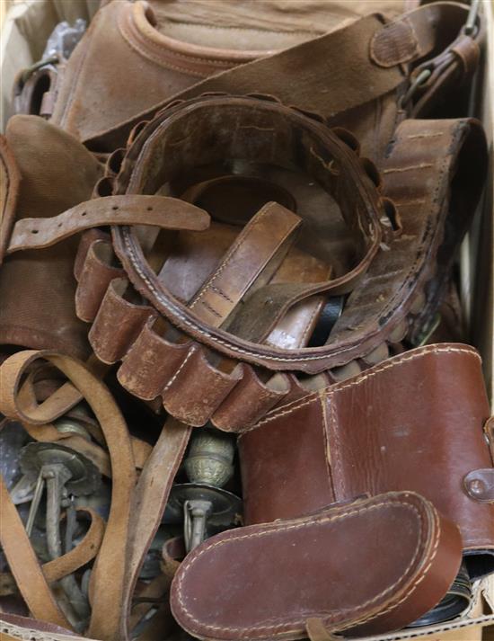 Two pairs of binoculars, a leather cartridge belt, etc.